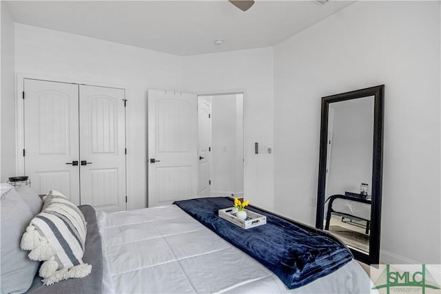 bedroom with ceiling fan and a closet