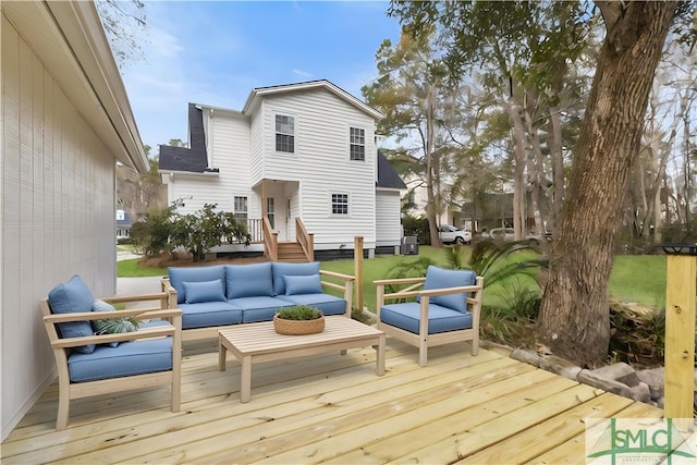 wooden terrace featuring outdoor lounge area