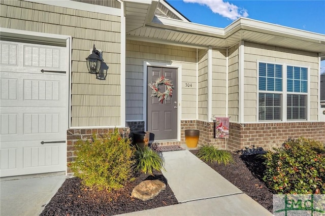 property entrance with a garage