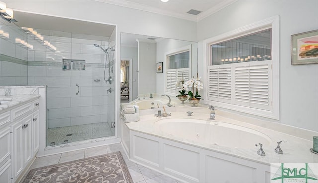 bathroom with tile patterned flooring, vanity, ornamental molding, and separate shower and tub