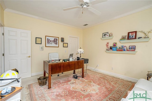 carpeted office featuring ceiling fan and ornamental molding