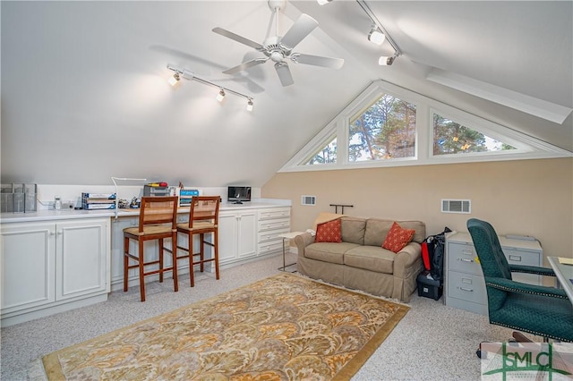 office with ceiling fan, lofted ceiling, and track lighting