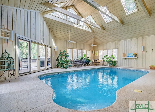 view of pool featuring a skylight