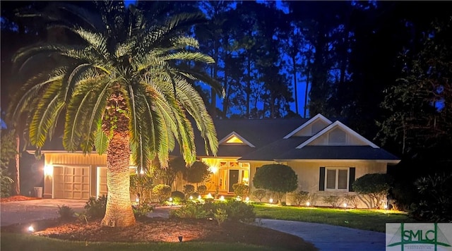 view of front of home with a garage