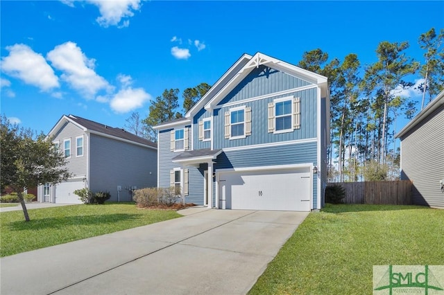 view of front of property with a garage and a front yard