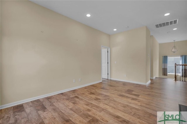 unfurnished room featuring light wood-type flooring