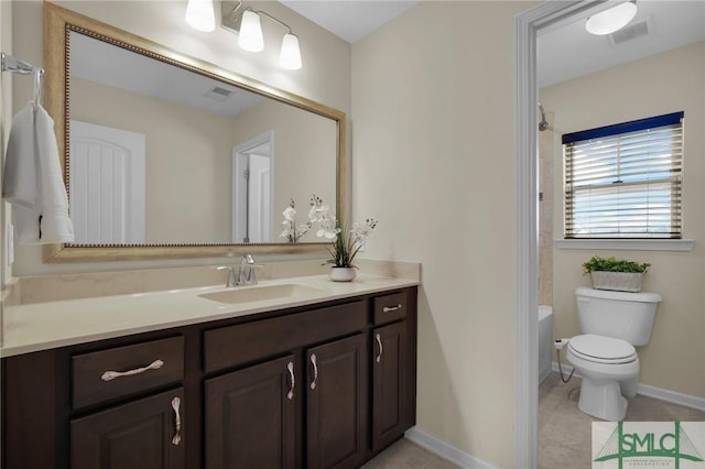 full bathroom with tile patterned flooring, vanity, shower / tub combination, and toilet