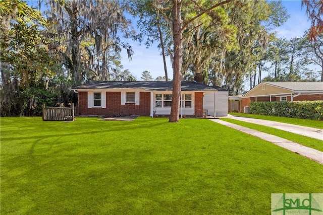 ranch-style house with a front lawn