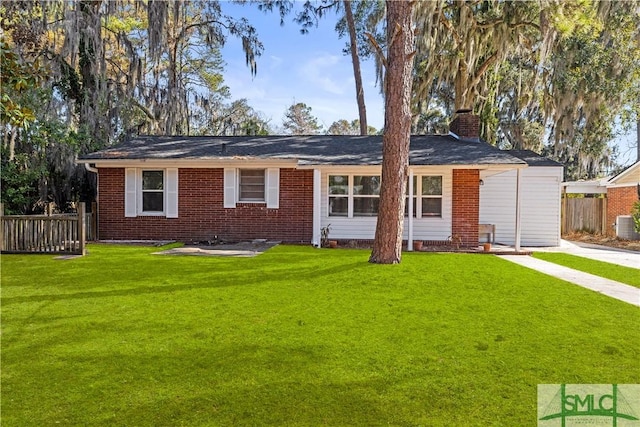 ranch-style home with a front yard