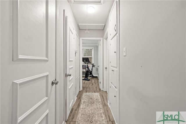 hallway featuring light hardwood / wood-style flooring