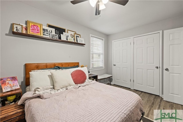 bedroom featuring ceiling fan and hardwood / wood-style floors