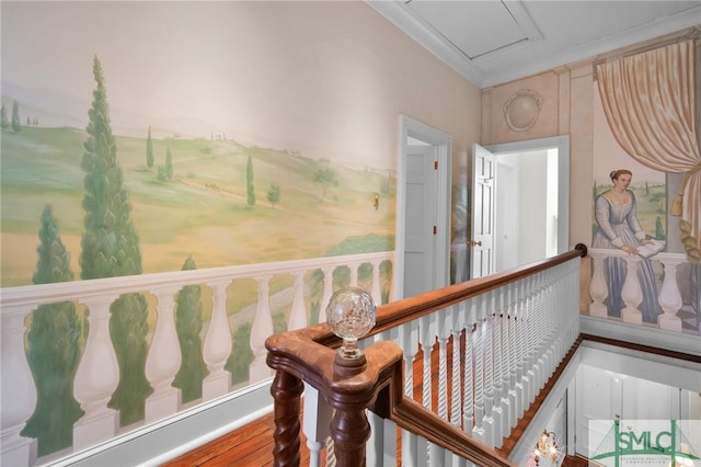 hallway featuring wood-type flooring and ornamental molding