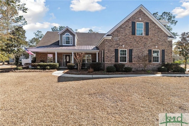 view of property featuring covered porch