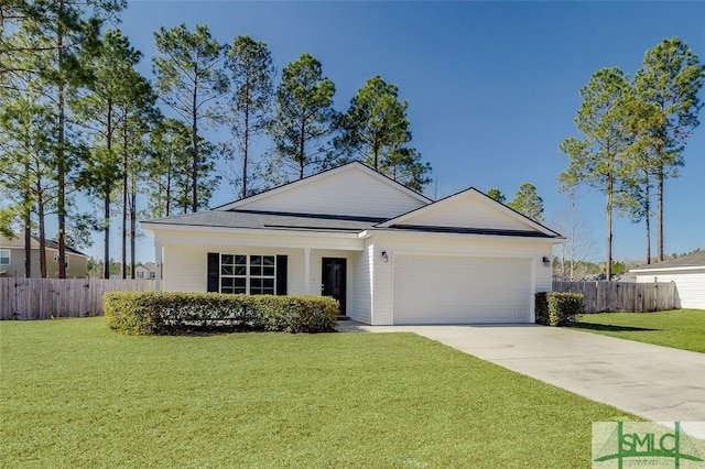 ranch-style home featuring a garage and a front yard