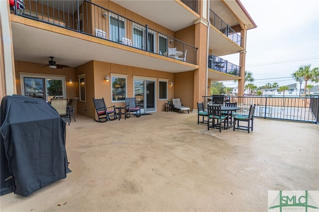 view of patio / terrace with a grill and ceiling fan