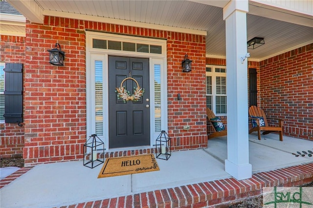 doorway to property with a porch