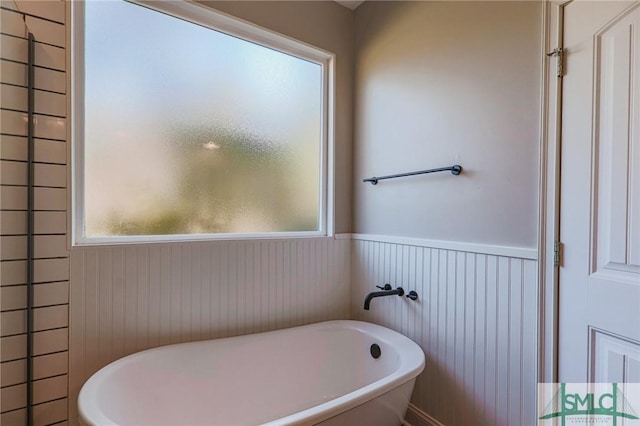 bathroom with a bathing tub