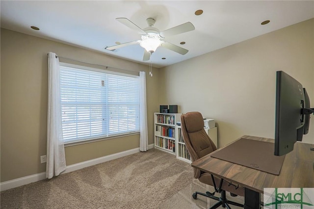 office featuring carpet and ceiling fan