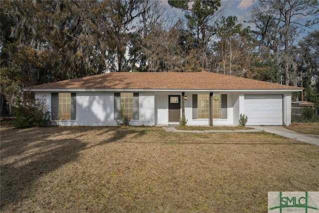 single story home with a garage and a front yard