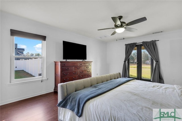 bedroom featuring french doors, ceiling fan, and dark hardwood / wood-style floors