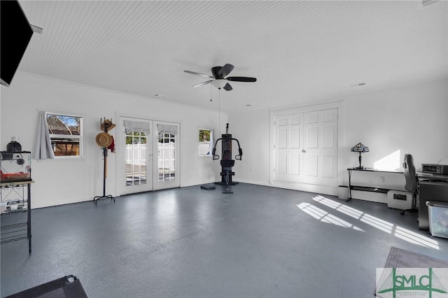 exercise room with french doors and ceiling fan