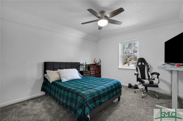 carpeted bedroom featuring crown molding and ceiling fan