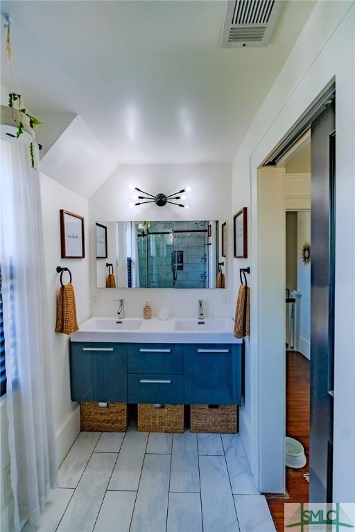 bathroom featuring vanity and ceiling fan