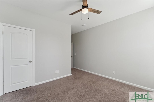 unfurnished bedroom with carpet floors and ceiling fan