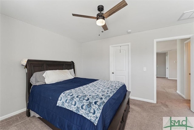 carpeted bedroom featuring ceiling fan and a closet