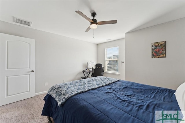 bedroom with ceiling fan and carpet floors