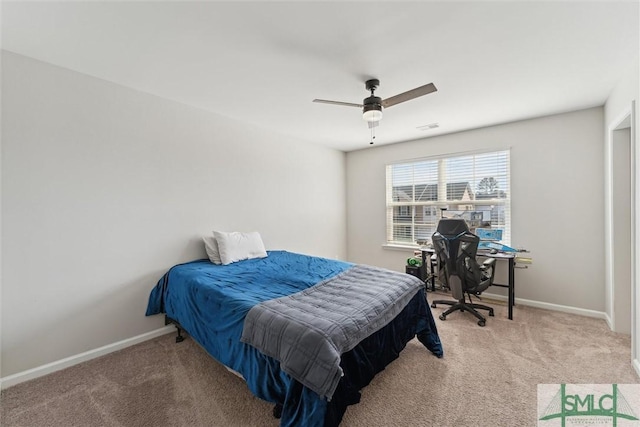 carpeted bedroom with ceiling fan