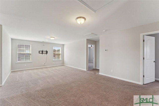 empty room featuring carpet flooring