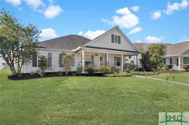 view of front of property with a front yard and a porch