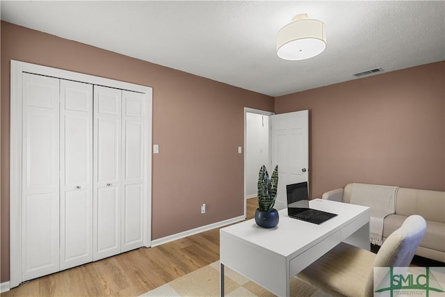 office featuring light hardwood / wood-style floors