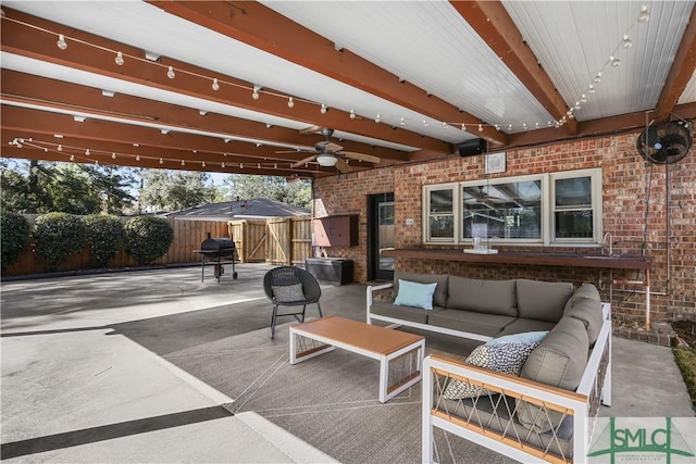 view of patio / terrace featuring outdoor lounge area, a grill, and ceiling fan