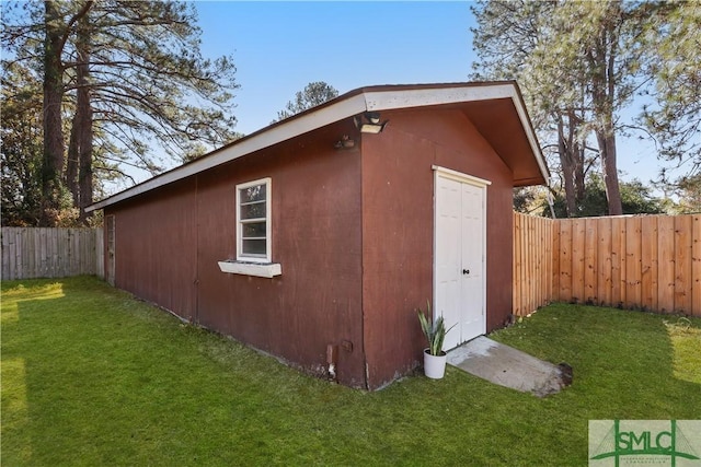 view of outdoor structure featuring a yard