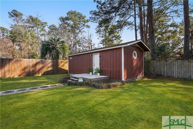 view of outbuilding with a lawn