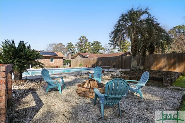 exterior space featuring an outdoor fire pit