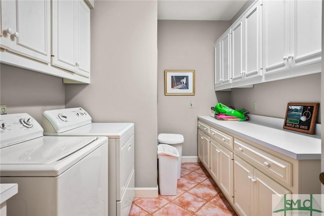 1 Bishopwood Ct, Savannah, GA 31411 - laundry room featuring washer and dryer, cabinet space, baseboards, and light tile patterned floors