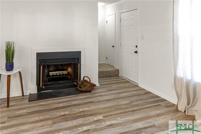 interior space with hardwood / wood-style flooring