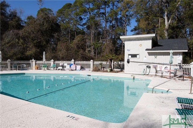 view of pool featuring a patio area