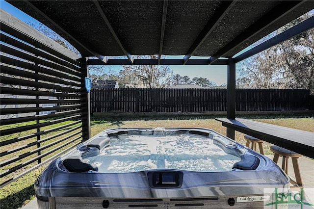 exterior space featuring a hot tub