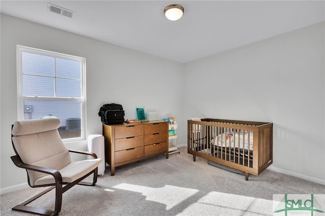 bedroom with light carpet