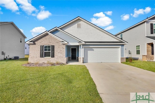 view of front facade with a garage and a front yard