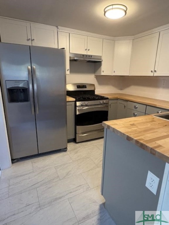 kitchen featuring white cabinetry, appliances with stainless steel finishes, wooden counters, and gray cabinetry