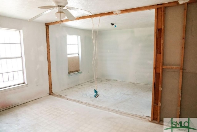 spare room with ceiling fan