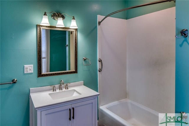 bathroom with vanity and shower / tub combination