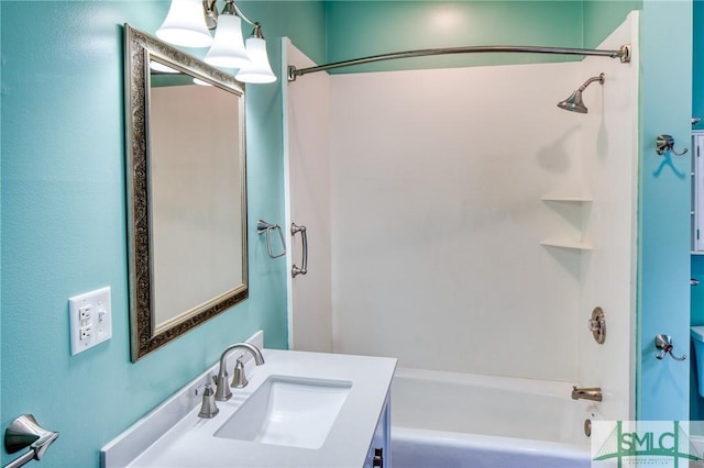 bathroom featuring vanity and shower / bathing tub combination