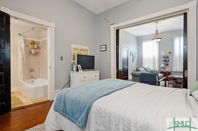 bedroom featuring wood-type flooring