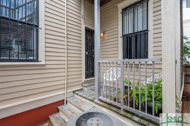 entrance to property featuring a porch